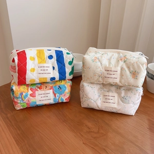 Quilted floral and polka dot cotton makeup bags with cute French label and zipper