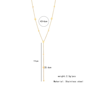 Macro shot of gold stainless steel Y-necklace with teardrop charms and dimension details