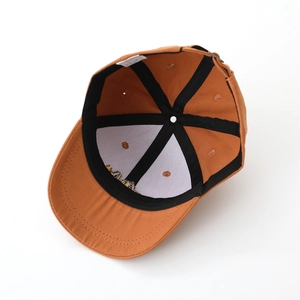 Interior view of kids cotton baseball cap with excavator embroidery and reinforced seams