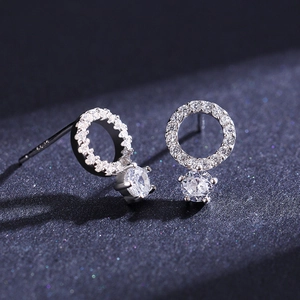 Elegant S925 sterling silver stud earrings featuring micro-pave halo and large center stone