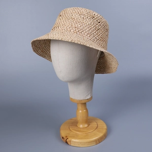 Premium hand-woven raffia sun hat for women with elegant round top and wide brim