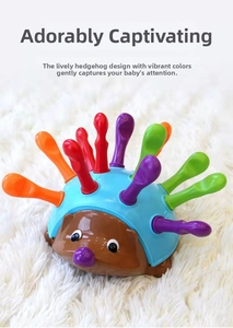 Detail of colorful sticks and back slots of the hedgehog sensory toy for fine motor skills