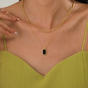 Double-layered stainless steel necklace featuring a black square pendant and Figaro chain