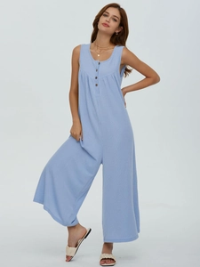 Detail view of light blue ribbed sleeveless jumpsuit with button neckline and wide leg cut