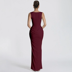 Macro view showing back detail of a wine red slim fit evening gown with U-shaped neckline