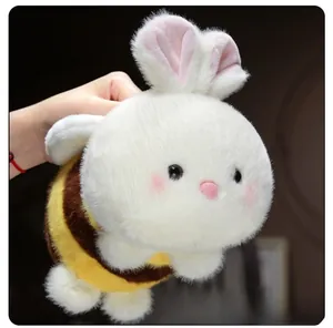 Detailed close-up showing the soft plush texture and firm filling of the bunny bee doll