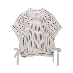 Beige chunky knit vest with side tie bows featuring openwork crochet texture on white background