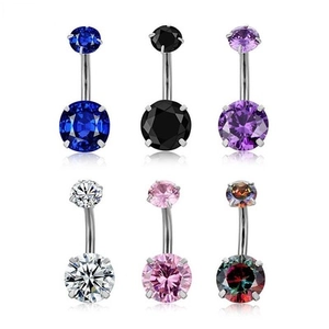 Close-up of six surgical steel belly rings with multicolored round-cut cubic zirconia