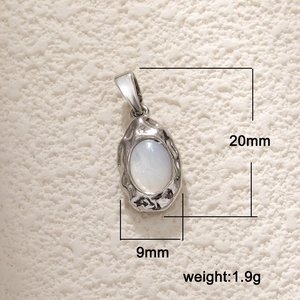 Detailed view of an oval white shell pendant with dimensions 20mm by 9mm and weight 1.9g