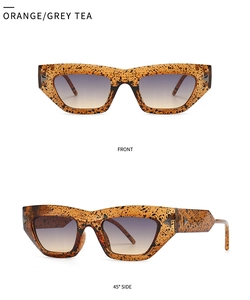 Front and 45-degree side views of orange leopard cat-eye sunglasses with gradient lenses