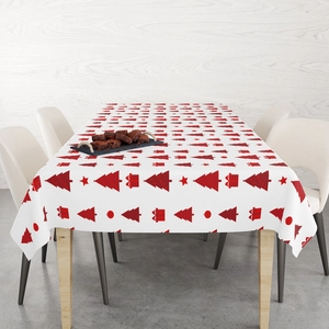 Christmas red plaid tablecloth with festive tree patterns on a wooden dining table