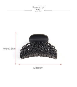 Matte black hollow scroll hair claw clip dimensions showing 7cm width and 3.5cm height