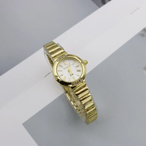 Elegant gold quartz watch for women with white Roman numeral dial and diamond accents