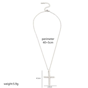 Detailed view of pavé zircon cross pendant with 4.3cm height and 40+5cm chain specs