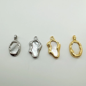 Detailed close-up of 18K gold-plated irregular pendants with natural white mother of pearl