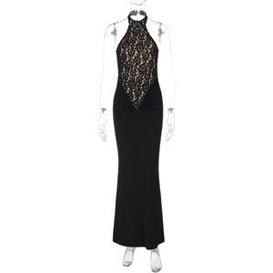 Close-up of elegant halter neck black lace bodice and floor-length evening dress detail