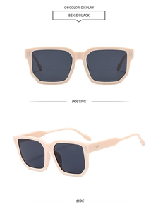 Detail view of beige square frame sunglasses with dark lenses and silver rivet accents