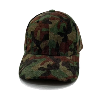 Detail of camouflage corduroy baseball cap showing textured fabric and six-panel design