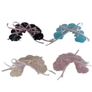 Ballet-style acetate hair claws with pink silk ribbon bows in four assorted colors