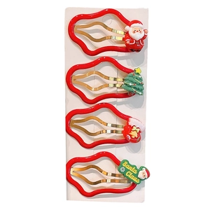Christmas hair clips set for girls featuring Santa, tree, and stocking festive elements