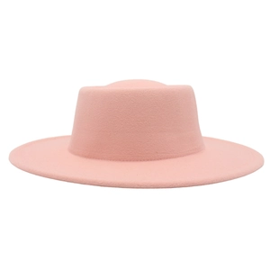 Close-up of a pink cashmere felt fedora featuring a flat top and a wide straight brim