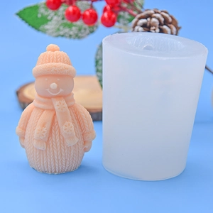 Detail of Christmas snowman silicone mold featuring intricate knitted sweater texture and scarf