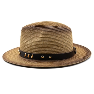 Detail of gradient woven fedora hat with black leather band and gold metal rivet accents