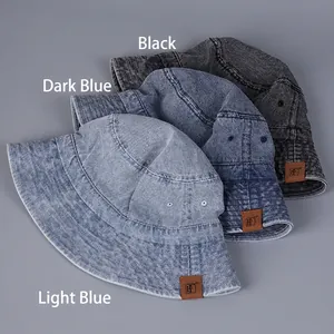 Three-piece set of washed denim bucket hats in light blue, dark blue, and black colors