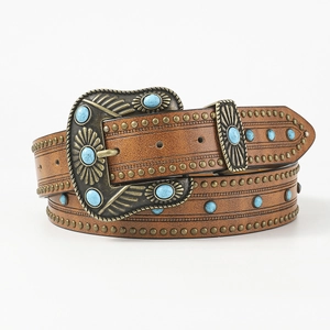 Vintage western brown leather belt with turquoise stones and studded buckle on white back