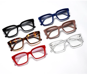 Flat lay display of multi-color oversized square frame glasses in six vibrant color styles