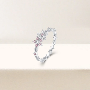 Detail of 925 silver ring featuring pink and white star shaped zirconia stones