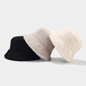 Plush faux fur bucket hat for women in black, beige and cream for autumn winter fashion