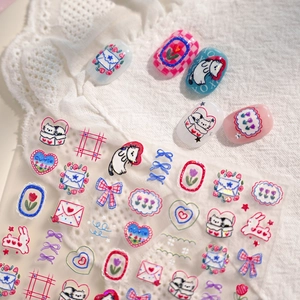 Cartoon nail art stickers featuring cats, rabbits and floral relief designs for manicure