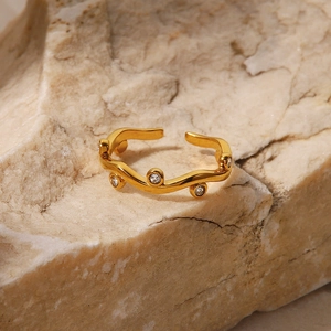 French style 18K gold leaf open ring with sparkling white diamonds on beige stone