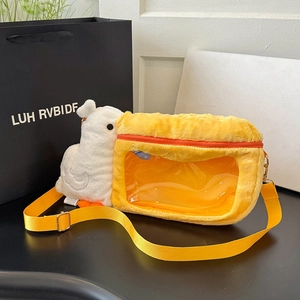 Detailed macro view of pelican plush camera bag with a transparent front storage window