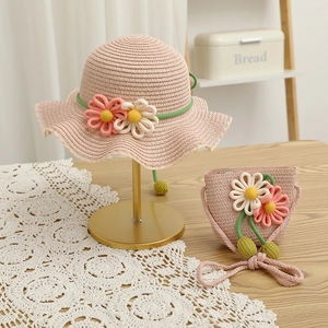 Pink straw sun hat and matching flower bag set with scalloped edges for girls