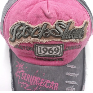 Close-up of distressed denim baseball cap featuring Rock Shank 1969 embroidery detail