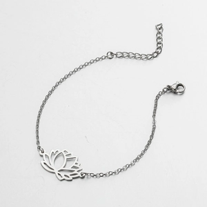 Detail of silver stainless steel lotus charm bracelet with lobster clasp and extender