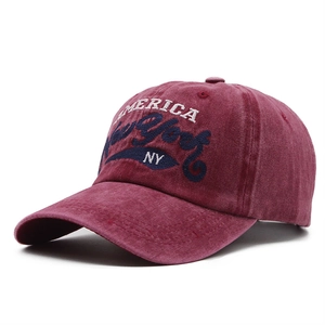 Detail of vintage washed cotton baseball cap featuring 3D New York America embroidery
