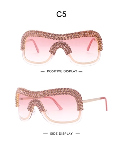 Detail view of pink gradient sunglasses with rhinestone metal temples in C5 color way