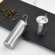 Detail view of 304 stainless steel and glass tea infusers with fine mesh and hanging chains