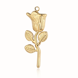 Macro view of a gold rose-shaped pendant made of titanium steel with detailed texture