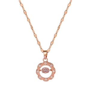 Rose gold ring necklace with pink oval gemstone and diamond halo on white background