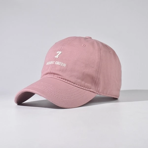 Close-up of pink cotton baseball cap featuring high-quality white letter Z embroidery