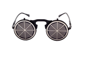 Detail of round flip-up sunglasses featuring a silver gothic spider web metal design