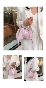 Detailed views of pink snakeskin shell bag with gold hardware and sparkly finish