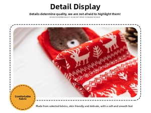Detailed knit texture of a red Christmas sock featuring a 3D plush bear and reindeer pattern