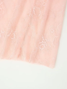 Pink floral lace high-waisted skirt featuring delicate mesh embroidery and airy texture