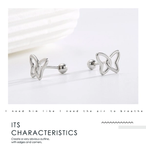 Detail of silver hollow butterfly stud earring with screw back ball closure