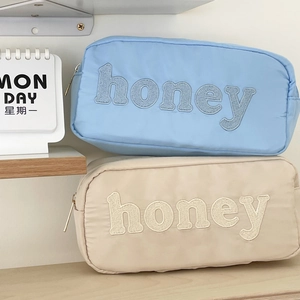 Blue and beige nylon makeup bags with honey embroidery and large capacity storage